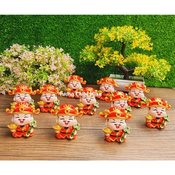 Thị trường hiện nay có nhiều loại tượng Thần Tài với kích thước đa dạng – từ 4 cm tới 12 cm. (Ảnh 5) Thị trường hiện nay có nhiều loại tượng Thần Tài với kích thước đa dạng – từ 4 cm tới 12 cm. (Ảnh 5)