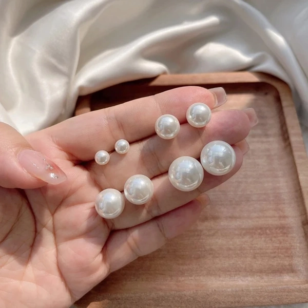 Bông tai trắng thanh lịch khiến nét tinh tế của trang phục đám cưới nổi bật hơn bất ngờ - Ảnh 1 Bông tai trắng thanh lịch khiến nét tinh tế của trang phục đám cưới nổi bật hơn bất ngờ - Ảnh 1