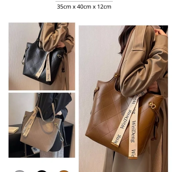 Chiếc túi tote da mềm đủ rộng cho A4 và laptop 15‑inch nhưng sức nặng khi mang dài giờ lại khiến bất ngờ - Ảnh 1