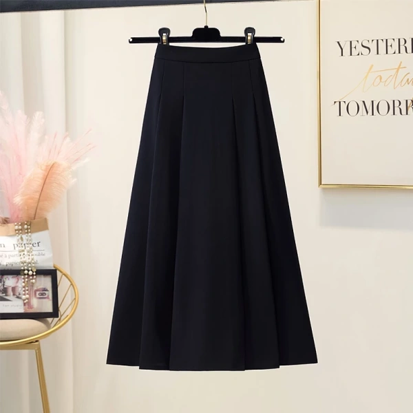 Độ dài qua gối của chân váy xếp li lưng cao thực sự giảm cảm giác căng thẳng trong các buổi họp dài. - Ảnh 5