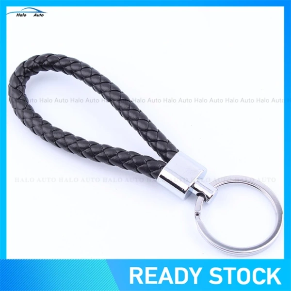 Khi dây da bện trên móc khóa khiến việc cầm chìa khóa xe hơi điều khiển từ xa trở nên bất tiện hơn. - Ảnh 2 Khi dây da bện trên móc khóa khiến việc cầm chìa khóa xe hơi điều khiển từ xa trở nên bất tiện hơn. - Ảnh 2