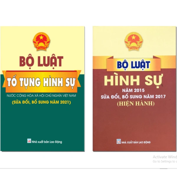 Khi mua bộ sách luật hình sự và luật tố tụng, trang phụ lề thiếu chỉ dẫn khiến việc tra cứu trở nên rắc rối hơn. - Ảnh 1
