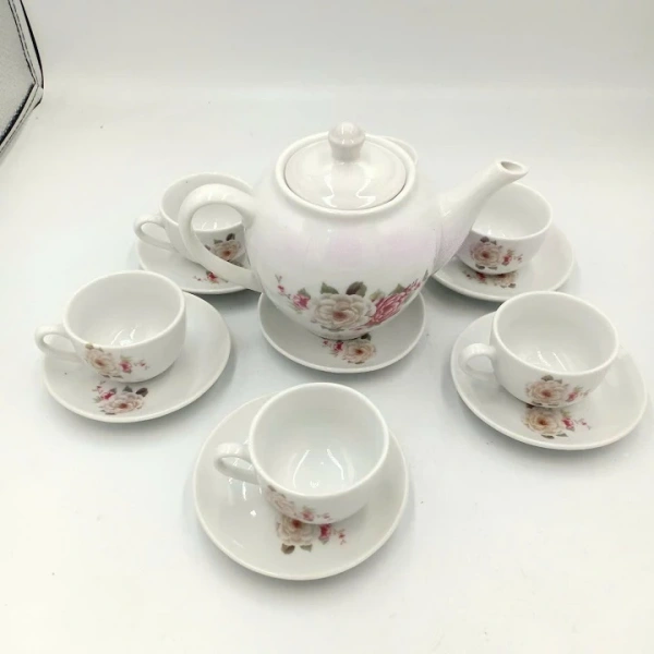 Khi tay cầm trơn trên bộ ấm trà gốm mùa xuân khiến buổi trà Tết bị gián đoạn - Ảnh 2