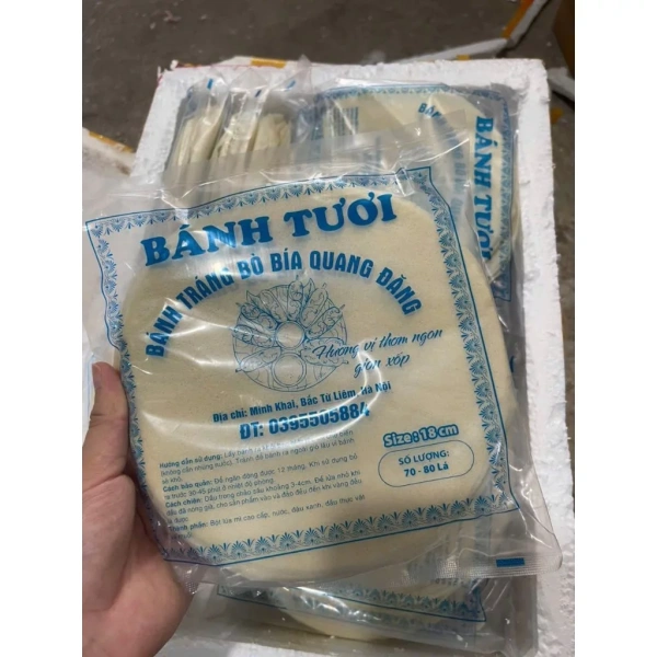 Vỏ bìa, dù là bánh tráng tươi hay vỏ bò bía, đều được sản xuất qua các công đoạn chung: chọn nguyên liệu, làm bột, ép lớp mỏng, và khô hoặc đông lạnh. (Ảnh 2)