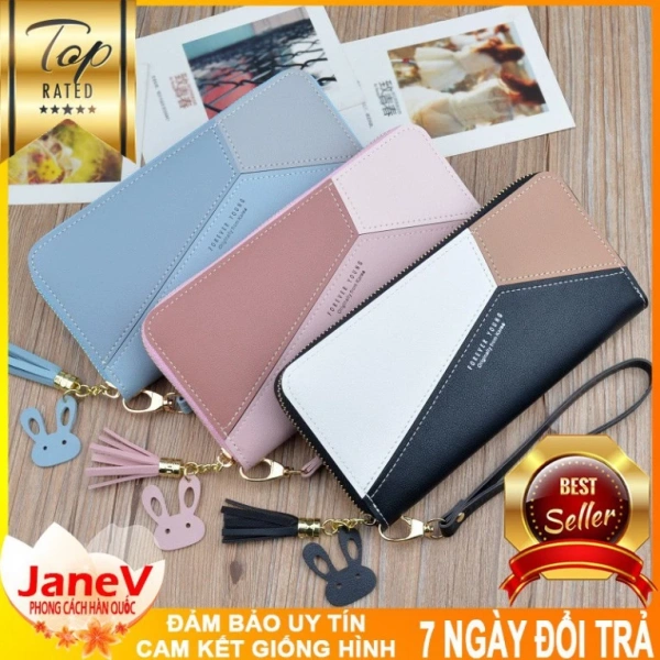 Khi ví cầm tay dài sang trọng kiểu Hàn Quốc làm giảm độ thoải mái của áo blazer mỏng - Ảnh 1 Khi ví cầm tay dài sang trọng kiểu Hàn Quốc làm giảm độ thoải mái của áo blazer mỏng - Ảnh 1