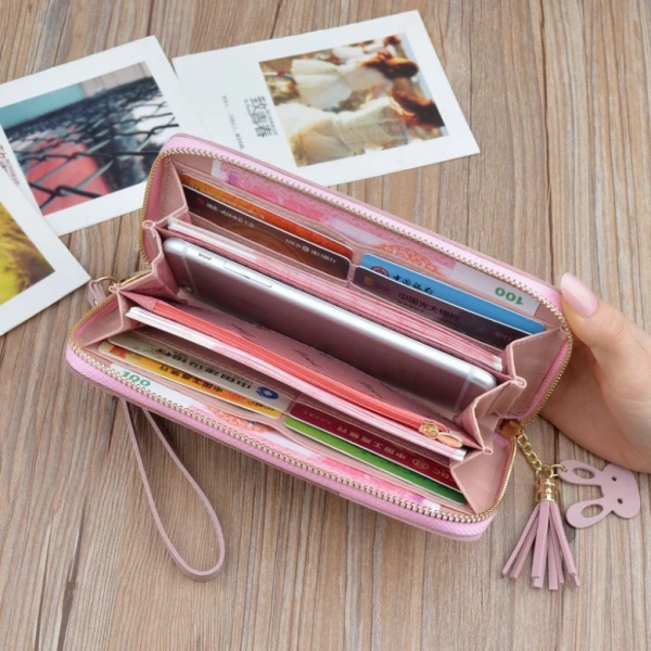 Ví cầm tay dài kiểu Hàn Quốc thường có kích thước 19,5 × 9,5 × 2,5 cm, trọng lượng khoảng 0,18 kg. (Ảnh 2) Ví cầm tay dài kiểu Hàn Quốc thường có kích thước 19,5 × 9,5 × 2,5 cm, trọng lượng khoảng 0,18 kg. (Ảnh 2)