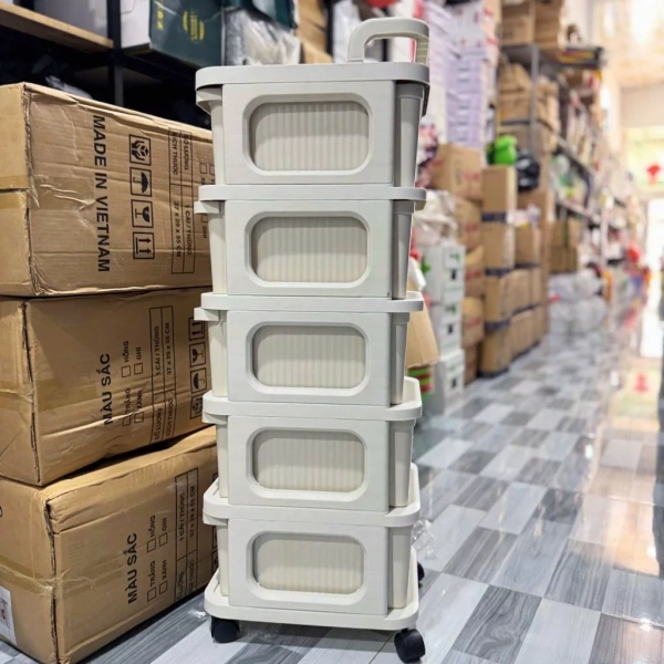 Một số tủ đa năng được thiết kế với ngăn kín chống bụi để bảo quản bỉm, sữa hoặc mỹ phẩm cho mẹ. (Ảnh 2)