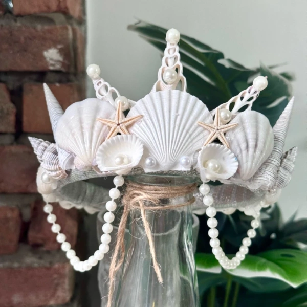 Nhận ra vương miện vỏ sò khiến tóc dễ rối hơn so với mong đợi sau buổi chụp ảnh cưới - Ảnh 5 Nhận ra vương miện vỏ sò khiến tóc dễ rối hơn so với mong đợi sau buổi chụp ảnh cưới - Ảnh 5