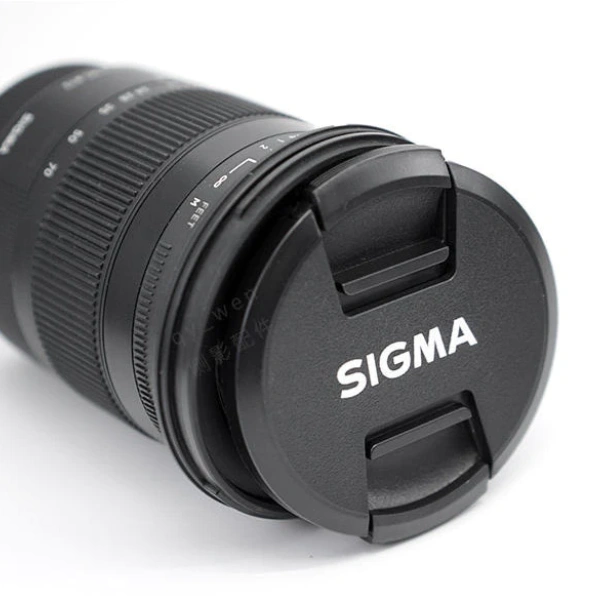 Với mức giá 291.214 VND (giảm còn 238.700 VND), Vỏ ống kính Sigma 56mm F1.4 là lựa chọn hợp lý cho những ai sở hữu máy ảnh Sony E‑mount hoặc Fujifilm X‑mount. (Ảnh 4) Với mức giá 291.214 VND (giảm còn 238.700 VND), Vỏ ống kính Sigma 56mm F1.4 là lựa chọn hợp lý cho những ai sở hữu máy ảnh Sony E‑mount hoặc Fujifilm X‑mount. (Ảnh 4)