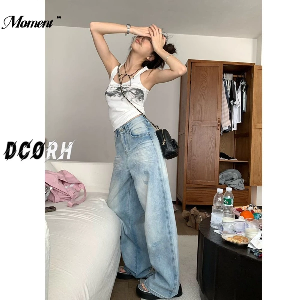 Quần ống rộng phong cách đường phố mùa hè: khi chi tiết rách khiến bước chân bớt thoải mái - Ảnh 1 Quần ống rộng phong cách đường phố mùa hè: khi chi tiết rách khiến bước chân bớt thoải mái - Ảnh 1