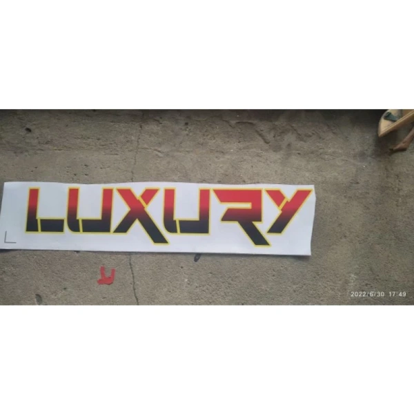Trên thị trường hiện nay, Tem chữ Luxury dán trang trí xe tải, xe ben là một trong những mẫu tem phổ biến nhờ thiết kế tinh tế và giá cả phải chăng. (Ảnh 5) Trên thị trường hiện nay, Tem chữ Luxury dán trang trí xe tải, xe ben là một trong những mẫu tem phổ biến nhờ thiết kế tinh tế và giá cả phải chăng. (Ảnh 5)
