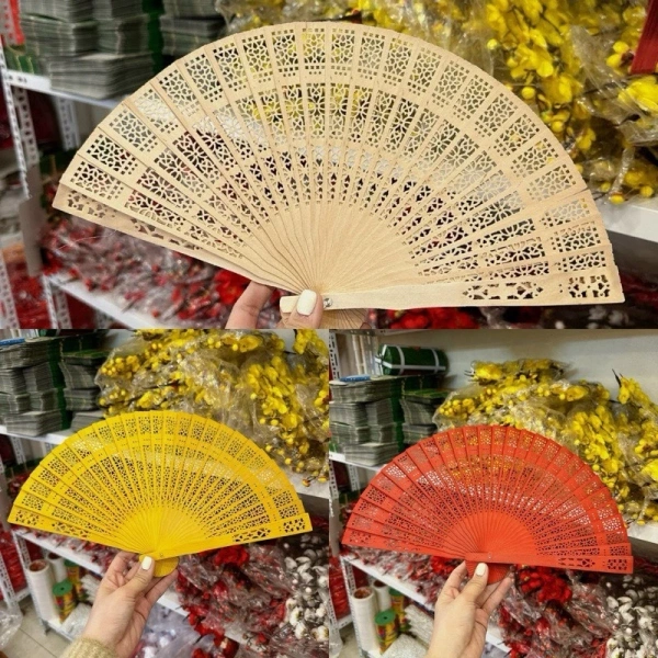 Thực tế một chiếc quạt gỗ tre trang trí trong lễ tết lại cần bảo quản khéo léo hơn mong đợi - Ảnh 1