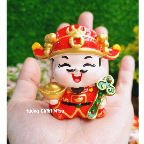 Bỗng nhận ra vị trí đặt tượng chibi Thần Tài trong không gian làm việc lại quyết định hơn cả hình dáng may mắn.