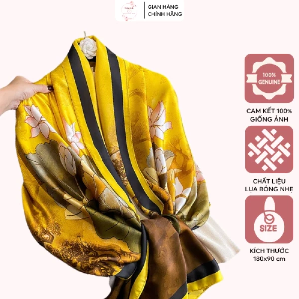 Cảm giác khi chiếc khăn lụa họa tiết sen xanh nhẹ chạm da khiến cả ngày làm việc trở nên thư thái hơn