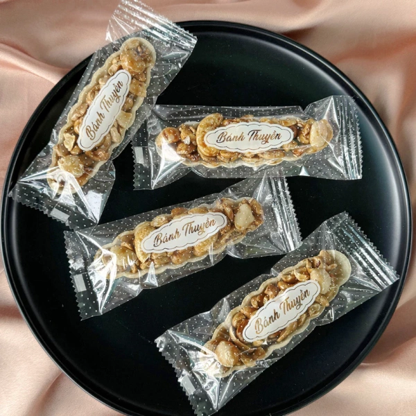 Để cải thiện khả năng giữ nhiệt, ưu tiên các túi có cấu trúc đa lớp (có ít nhất 2 lớp OPP/CPP hoặc thêm lớp PU) với độ dày tổng cộng từ 7–10 µm. (Ảnh 3)