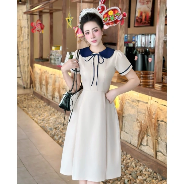 Vừa đẹp thanh lịch, vừa thoải mái: đánh giá thực tế về đầm công sở dáng xòe nhẹ tay ngắn eo tôn trong ngày làm việc - Ảnh 1 Vừa đẹp thanh lịch, vừa thoải mái: đánh giá thực tế về đầm công sở dáng xòe nhẹ tay ngắn eo tôn trong ngày làm việc - Ảnh 1