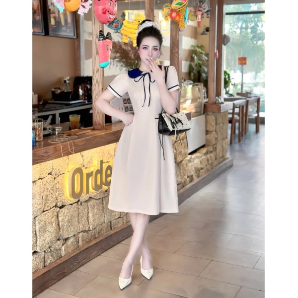 Khi đã quyết định mua một chiếc đầm công sở như trên, việc biết cách kết hợp sẽ tăng thêm độ “thành công” trong môi trường làm việc. (Ảnh 3) Khi đã quyết định mua một chiếc đầm công sở như trên, việc biết cách kết hợp sẽ tăng thêm độ “thành công” trong môi trường làm việc. (Ảnh 3)