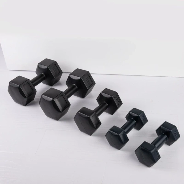 Hình dáng lục giác không chỉ là xu hướng thẩm mỹ hiện nay mà còn có một chức năng kỹ thuật: mỗi mặt phẳng tạo ra góc chắn, khiến tạ không dễ dàng quay tròn trên bề mặt bằng phẳng. (Ảnh 2)