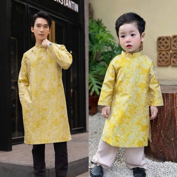 Áo dài gấm vàng không chỉ là một món trang phục, mà còn là biểu tượng của vẻ đẹp truyền thống được tôn lên bằng chất liệu cao cấp. (Ảnh 2)