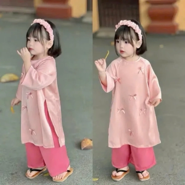 Bờm tóc nhún phồng đính hạt trai thực sự giữ được nét duyên dáng suốt cả ngày cho bé gái mặc áo dài Tết? - Ảnh 1