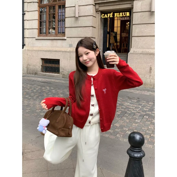 Cardigan nơ chi tiết dệt kim nữ giữ ấm mùa xuân‑thu, nhưng độ co giãn sau nhiều lần giặt thường làm mất form. - Ảnh 1
