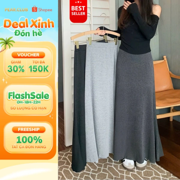 Chiều dài siêu dài của chân váy len mùa thu‑đông buộc người mặc phải tính lại cách phối giày cho các buổi tụ họp Tết. - Ảnh 1