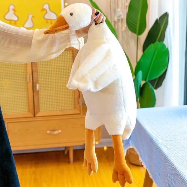 Trong số những mẫu gấu bông vịt trên thị trường, Gấu bông vịt thú nhồi bông ngan ngỗng vịt con nằm dễ thương được nhiều bà mẹ và trẻ em yêu thích nhờ thiết kế độc đáo và chất liệu chất lượng. (Ảnh 4)