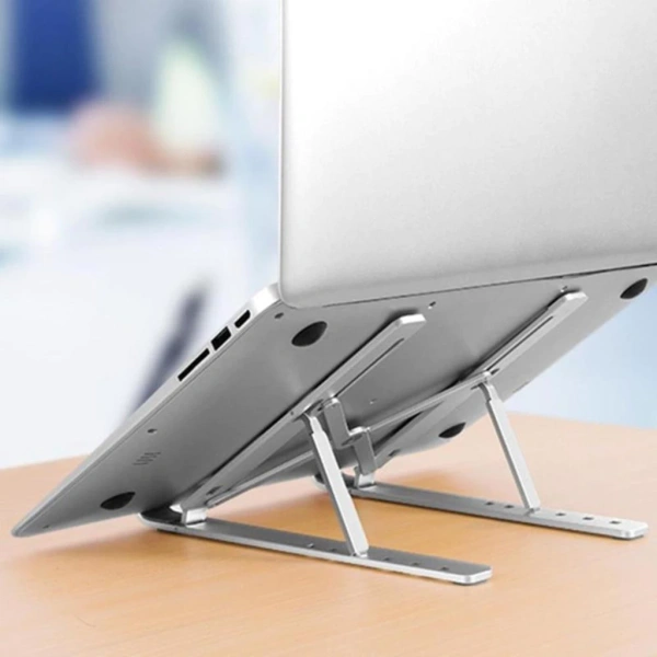 Nhôm nguyên khối có độ bền cao, chịu được trọng lượng của hầu hết các loại laptop hiện nay, kể cả Ultrabook và Surface. (Ảnh 5)