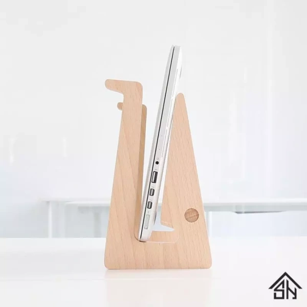 Giá đỡ laptop không chỉ là một công cụ hỗ trợ, mà còn có thể trở thành một phần của trang trí nội thất nếu bạn biết cách bố trí hợp lý. (Ảnh 4) Giá đỡ laptop không chỉ là một công cụ hỗ trợ, mà còn có thể trở thành một phần của trang trí nội thất nếu bạn biết cách bố trí hợp lý. (Ảnh 4)