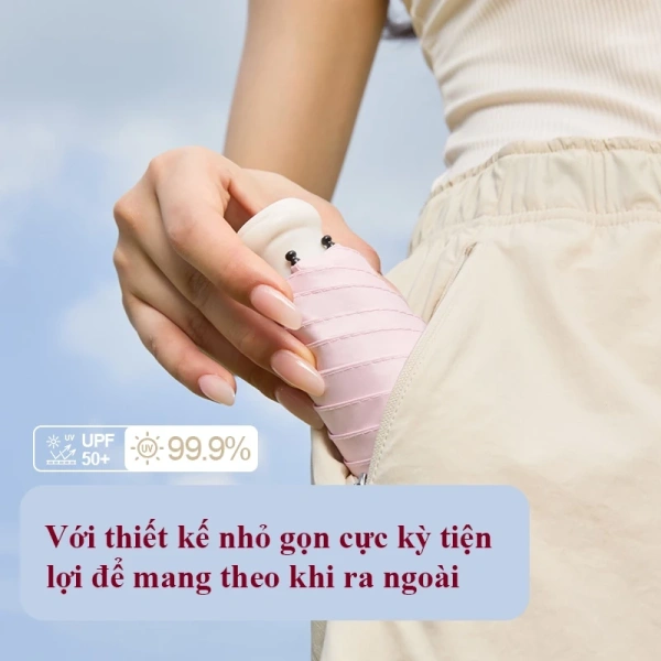 Giữa dòng mưa đột xuất và nắng gay gắt, ô mini gấp gọn trở thành giải pháp che nắng, che mưa bất ngờ mà ít ai nghĩ tới. - Ảnh 2