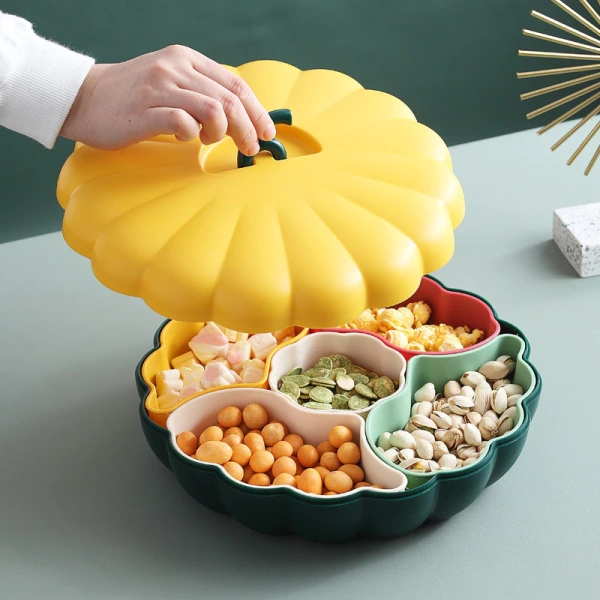 Hộp kẹo bí ngô biến phòng khách ngày Tết thành góc thưởng thức nhẹ nhàng – mong đợi so với thực tế - Ảnh 1 Hộp kẹo bí ngô biến phòng khách ngày Tết thành góc thưởng thức nhẹ nhàng – mong đợi so với thực tế - Ảnh 1