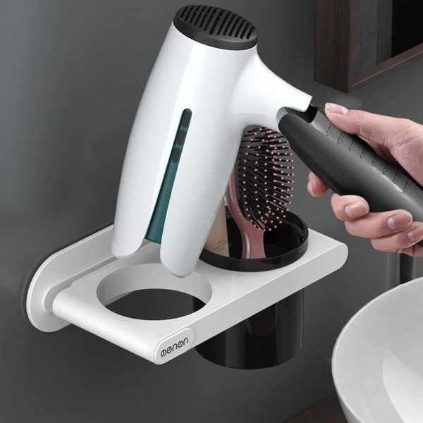 Kệ treo máy sấy tóc gắn tường được thiết kế để tận dụng diện tích tường trống, giúp giải phóng không gian sàn và bề mặt làm việc. (Ảnh 2) Kệ treo máy sấy tóc gắn tường được thiết kế để tận dụng diện tích tường trống, giúp giải phóng không gian sàn và bề mặt làm việc. (Ảnh 2)