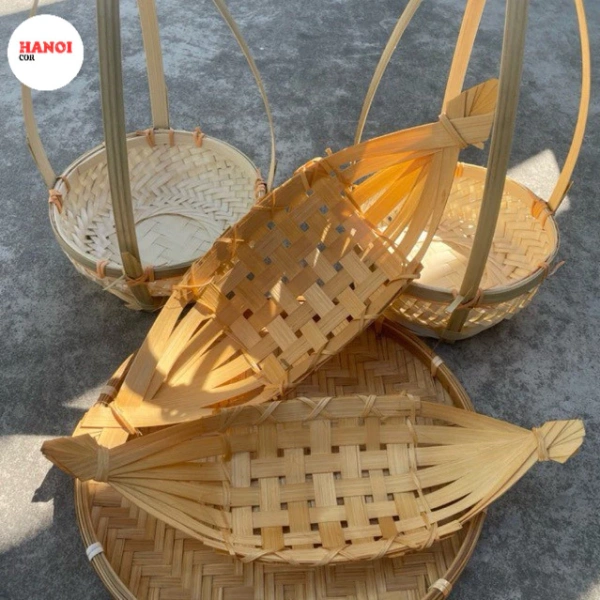 Khi một món đồ trang trí bằng tre giản đơn biến bánh kẹo trên bàn tiệc thành điểm nhấn bất ngờ. - Ảnh 1 Khi một món đồ trang trí bằng tre giản đơn biến bánh kẹo trên bàn tiệc thành điểm nhấn bất ngờ. - Ảnh 1