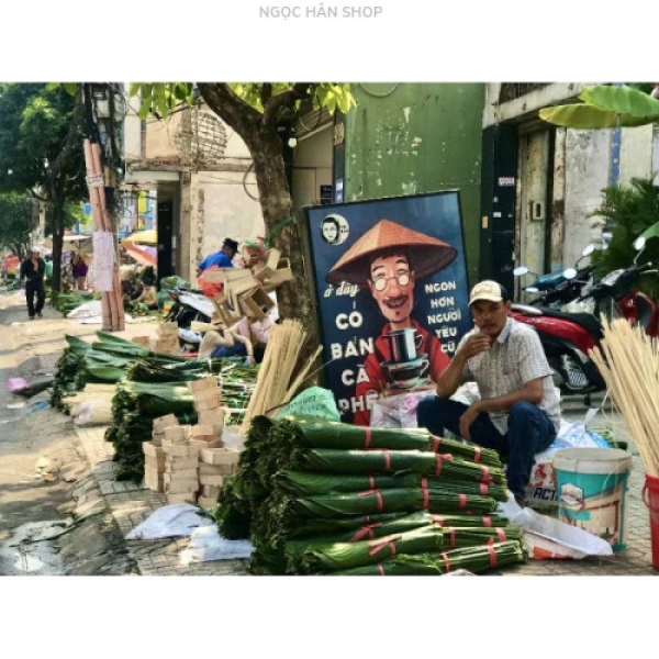 Hãy cùng tưởng tượng một khay bánh chưng được gói xong và đưa vào nồi luộc. (Ảnh 3)