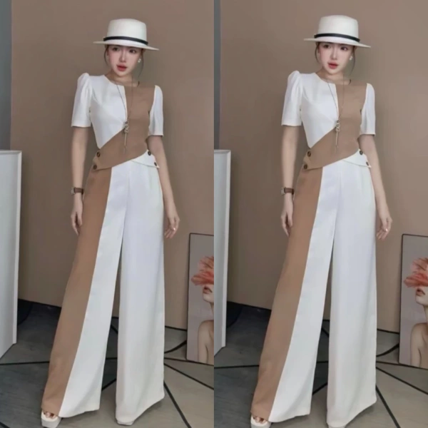 Bộ set được thiết kế với áo gài chéo, một kiểu dáng giúp kéo dài đường thắt lưng, tạo cảm giác thon gọn và sang trọng ngay cả khi không có áo khoác bên ngoài. (Ảnh 5)