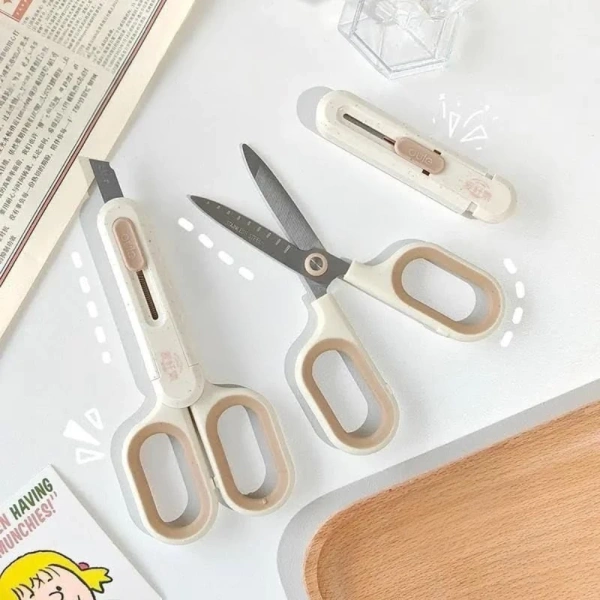 Sử dụng kéo‑đao rọc giấy 2 trong 1 dễ thương có khiến bìu giấy nhanh bị kẹt không? - Ảnh 1