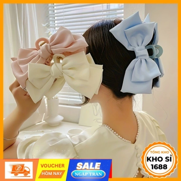 Sự thật về việc kẹp tóc nơ lụa thường trượt khi tóc ẩm - Ảnh 1 Sự thật về việc kẹp tóc nơ lụa thường trượt khi tóc ẩm - Ảnh 1