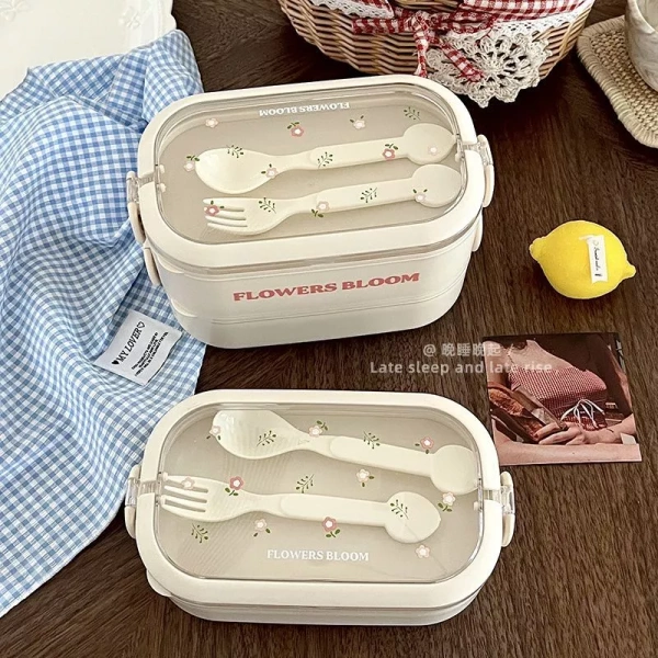 Thiết kế “cầm tay” của một số hộp cơm thường ưu tiên tính di động và thẩm mỹ hơn là khả năng giữ nhiệt kéo dài. (Ảnh 2) Thiết kế “cầm tay” của một số hộp cơm thường ưu tiên tính di động và thẩm mỹ hơn là khả năng giữ nhiệt kéo dài. (Ảnh 2)