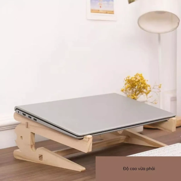 Căng thẳng dây cáp khi tháo rời kệ laptop bằng gỗ tự nhiên – một chi tiết dễ bỏ qua