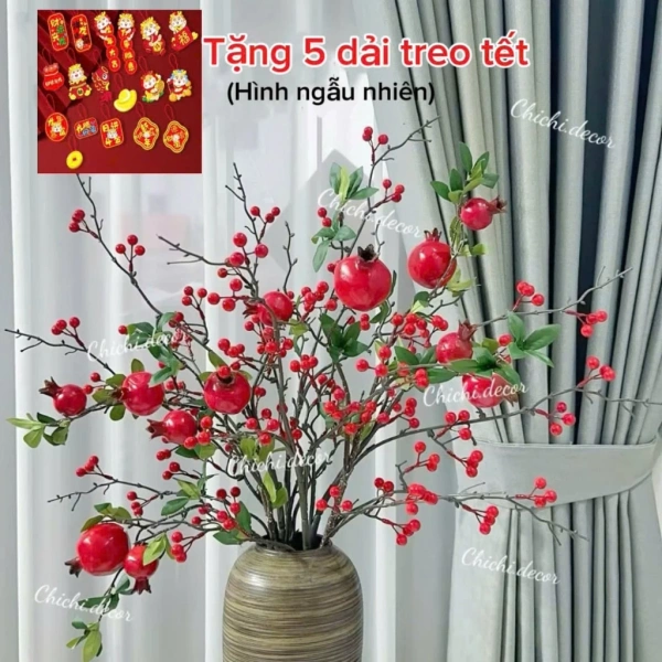 Chi tiết dải treo xanh lá đơn giản khiến không gian nhà chuyển thành rừng đồng ấm áp vào dịp Tết