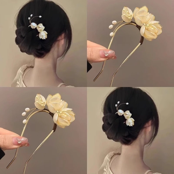 Chi tiết dây mỏng của trâm cài tóc hoa khiến búi cô dâu dễ trượt trong tiệc