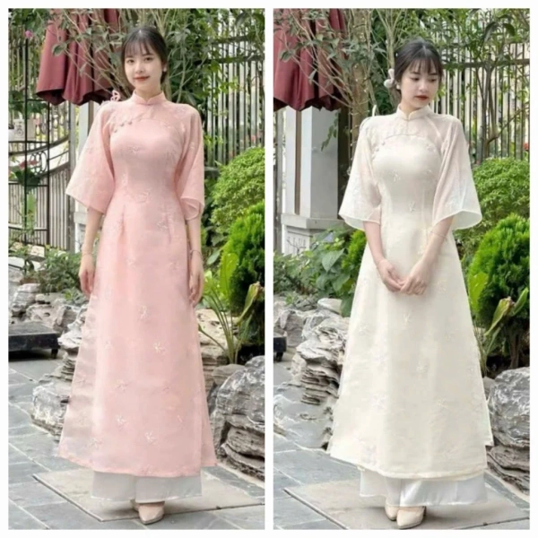 Khi áo dài lụa suông rộng kết hợp tay lửng giữ thanh nhã, nhưng độ bền lại mang lại bất ngờ cho người mặc