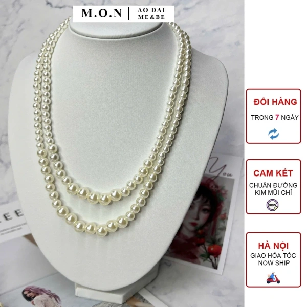 Một chi tiết nhỏ của vòng cổ hai tầng có thể làm mất cân bằng vẻ thanh lịch của áo dài cách tân và truyền thống